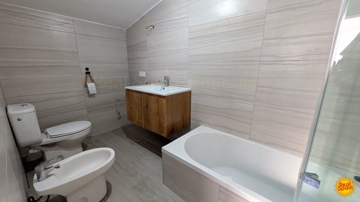 Bathroom at Cortijo Salud with bath, basin, toilet and bidet