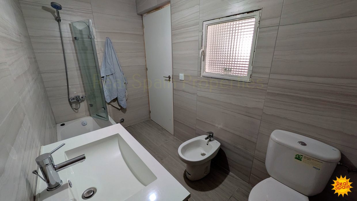 Bathroom at Cortijo Salud with shower, basin, toilet and bidet