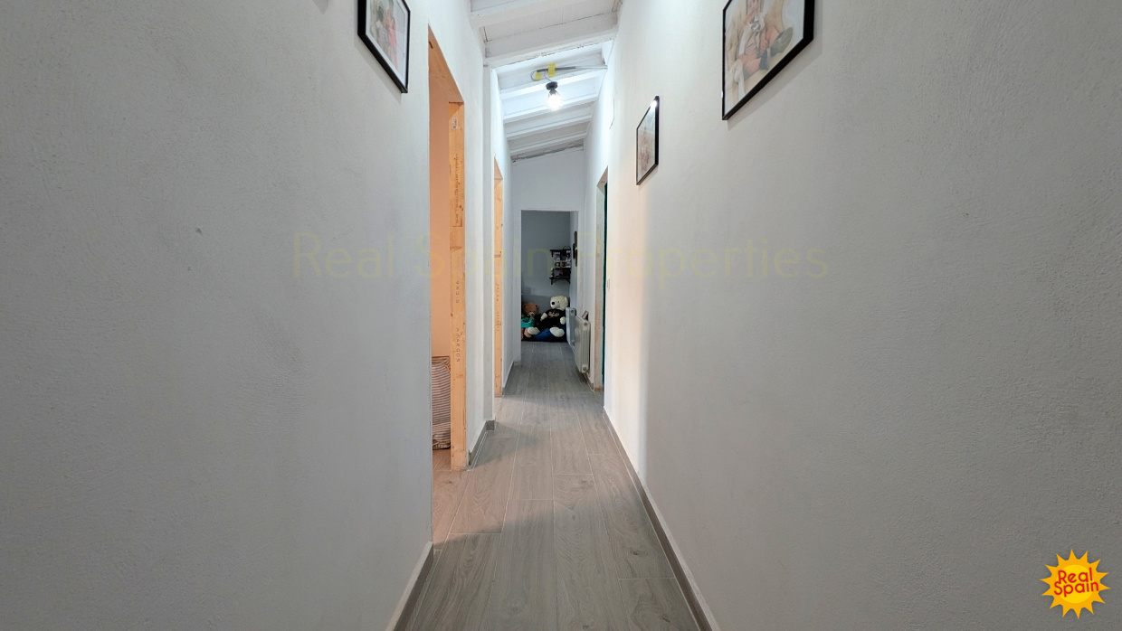 Hallway at Cortijo Salud connecting the rooms